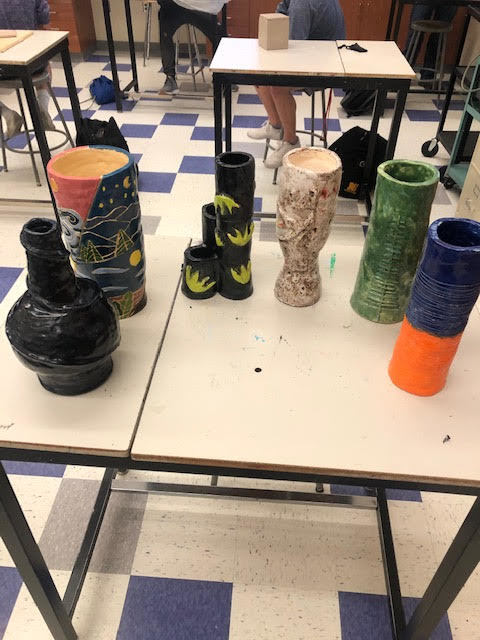 Ceramics students coil constructions